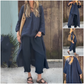 Ensemble deux pièces composé d'un haut et d'un pantalon avec un ourlet haut-bas de couleur unie