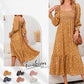 Robe élégante pour femme à manches évasées et motif floral