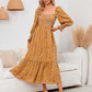 Robe élégante pour femme à manches évasées et motif floral