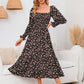 Robe élégante pour femme à manches évasées et motif floral