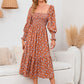 Robe élégante pour femme à manches évasées et motif floral