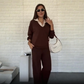 Set donna top e pantaloni con risvolto a maniche lunghe