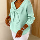 Maglione con fiocco con scollo a V da donna